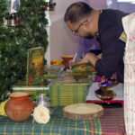 Ruhul Amin signing his book - Amar Shonar Bangla
