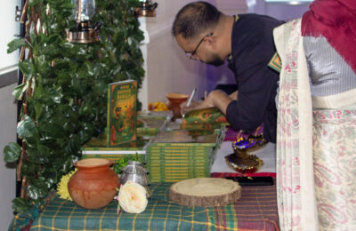 Ruhul Amin signing his book - Amar Shonar Bangla
